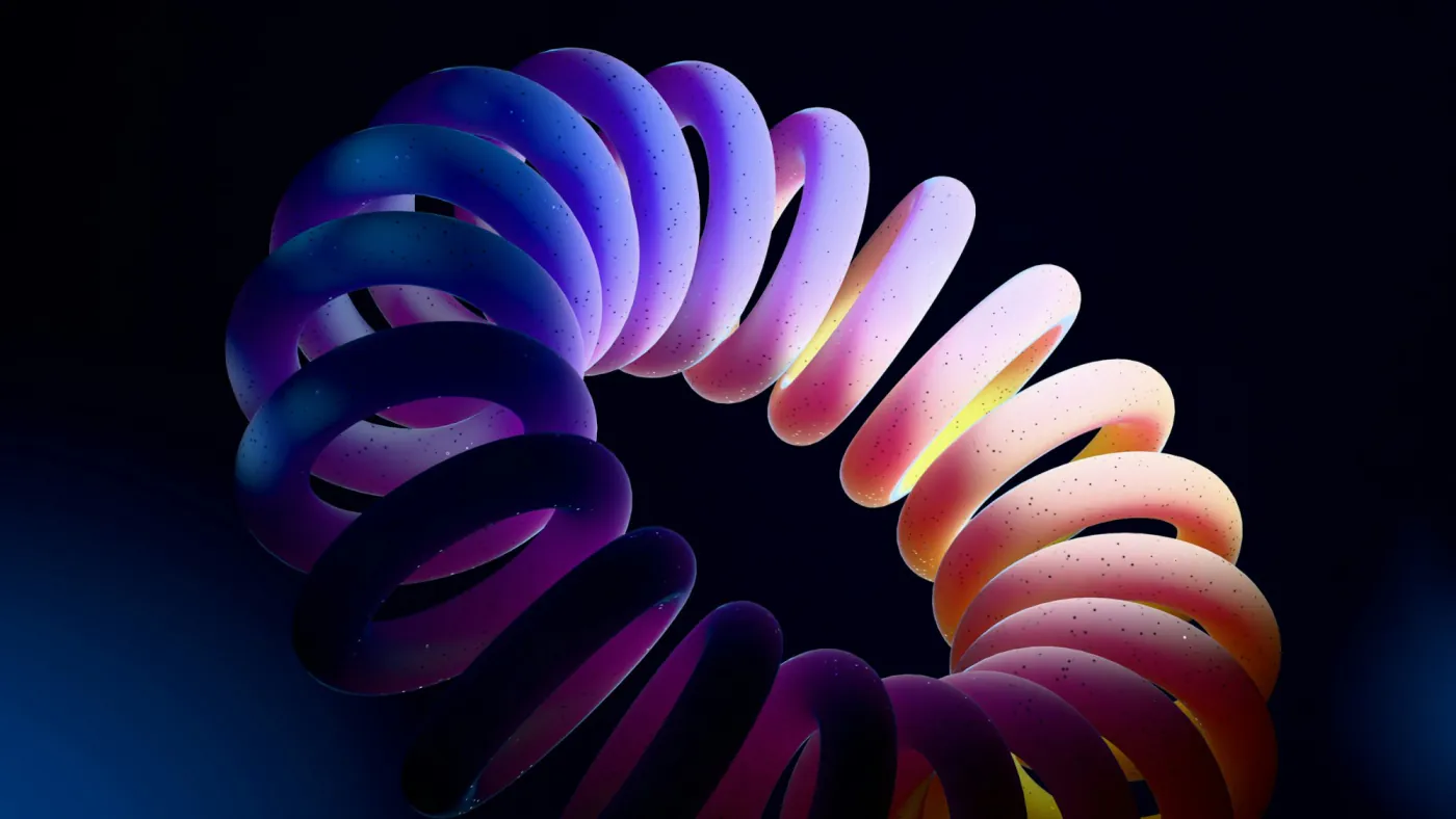 Coloured spiral fading from blue to orange on a dark background, a metaphor for the attack surface to be explored ring by ring